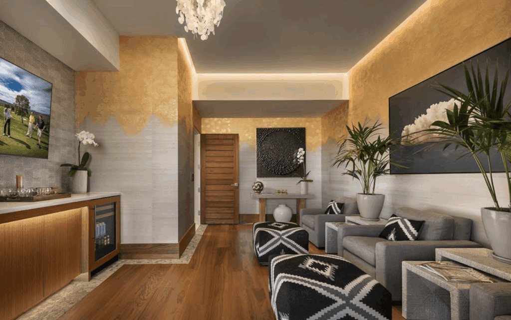 Cozy spa lounge with black-and-white furniture and golden accents.